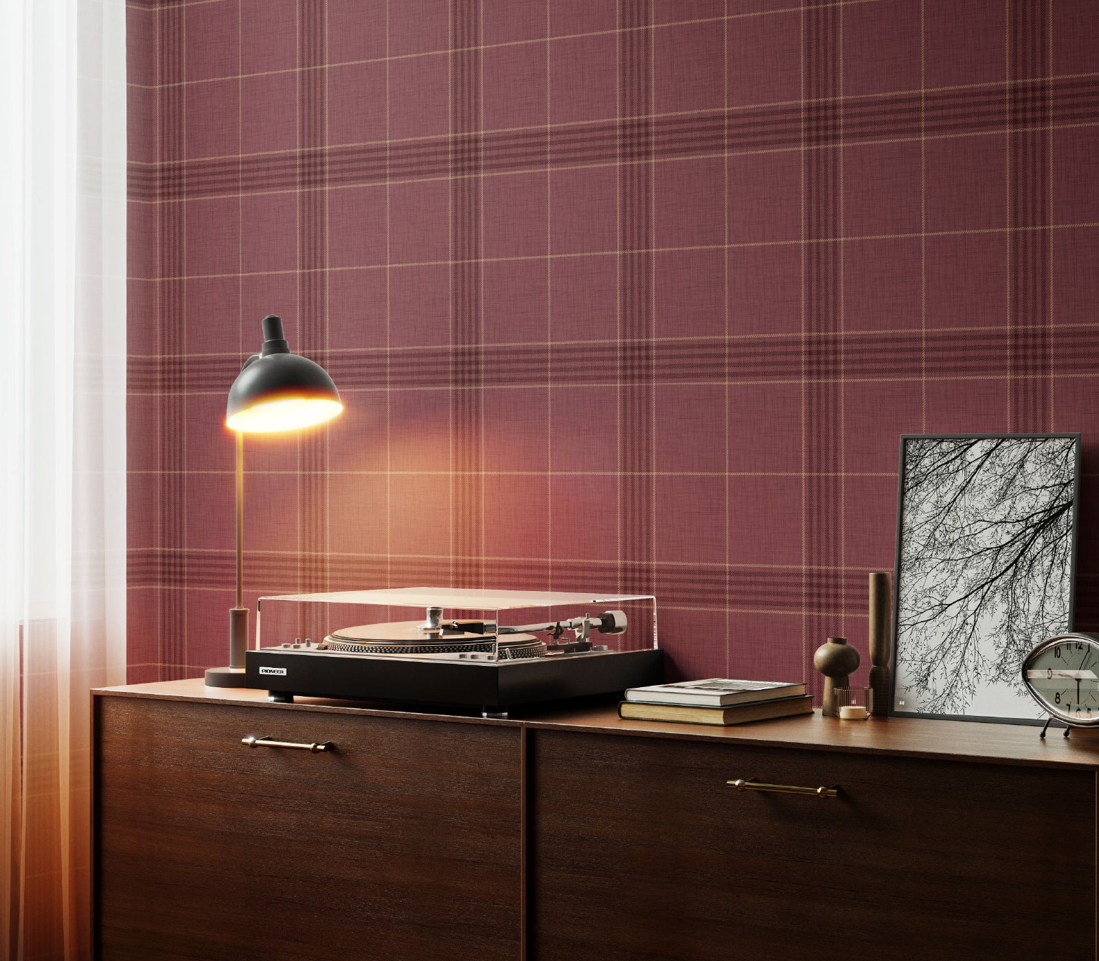 Turntable on a wooden cabinet with plaid wallpaper in the background